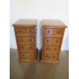 A pair of burr oak four drawer beside chests made by a local craftsman to a high standard,