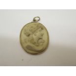 A well carved lava cameo in a gold mount, 33mm x 28mm, small fault or chip to shoulder otherwise