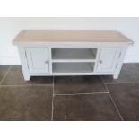 An ex display chalked oak TV unit, 50cm high x 120cm x 37cm