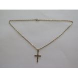 A hallmarked 9ct yellow gold crucifix on a 9ct hallmarked chain, 44cm long, approx 4.2 grams, in