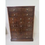 A walnut veneered sixteen drawer jewellery / trinket collectors chest, 47cm tall x 32cm x 20cm