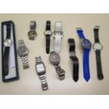 A quantity of gents quartz watches including Diesel, Jeep etc, some running and some may need