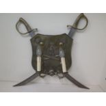 An Italian artillary shield and sword wall lamp, 54cm x 62cm