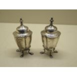 A pair of silver peppers, 8cm tall, 2.65 troy oz, both generally good with some rubbing