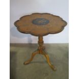 A decorated satinwood wine table by Druce and Co, 53cm tall x 43cm wide, with losses but a