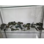 A collection of diecast and others military vehicles, all play worn and some repairs