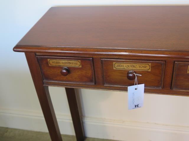 A five drawer mahogany hall table made by a local craftsman to a high standard, 76cm tall x 107cm - Image 3 of 4