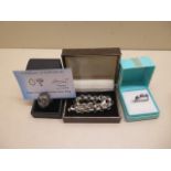 Two GTV silver rings and a silver 22cm bracelet, 1.6 troy oz, all good condition with one