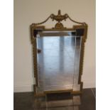 A 20th century Regency style pier mirror with gilded frame and bevelled plate mirror, 104cm tall x