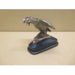 Motoring Interest: A Singer Motors Bantam car mascot on original enamel base, reg 802072, 11cm tall,