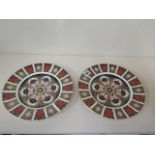 A pair of Royal Crown Derby Imari pattern 1128, 27cm diameter plates, both second quality but in