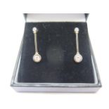 A pair of 18ct hallmarked yellow gold diamond drop earrings, approx 0.50ct of diamonds, 25mm drop,