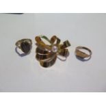 A 9ct pearl brooch marked 9ct and a hallmarked 9ct ring and a hallmarked 9ct cats eye ring, size