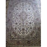 A hand knotted fine Kashan woollen rug, 2.24m x 1.44m, in good condition