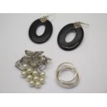 A pair of silver and black onyx drop earrings, a silver Russian style ring and a silver and pearl