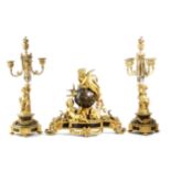 A French Napoleon III gilt and patinated bronze clock garniture by Raingo Freres, the eight day