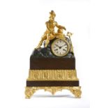 A French Charles X gilt and patinated bronze mantel clock, the eight day brass drum movement with an