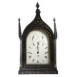 A William IV ebonised chiming bracket clock by Thomas Hunt of London, the three train brass movement