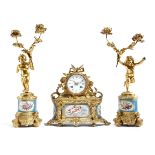 An ormolu and porcelain mounted clock garniture in Louis XVI style, the eight day brass movement
