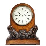 A Victorian oak mantel clock, the eight day brass repeating movement striking on a bell, the