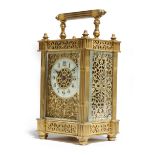 A late 19th century French gilt brass carriage timepiece, the eight day brass movement with a