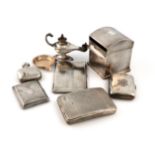 A mixed lot of silver items, various dates and makers, comprising: a table cigar lighter, modelled