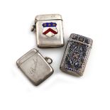 A Norwegian silver and enamel vesta case, rectangular form, with vari-coloured foliate decoration,