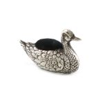 A novelty silver duck pin cushion, possibly by H J Cooper & Co Ltd, Birmingham 1920, modelled in a