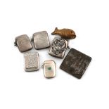 A collection of silver vesta cases, comprising: an unmarked American case by Udall and Ballou, New