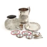 λA mixed lot, comprising silver items: a mug, by The Goldsmiths and Silversmiths Company, London