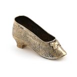 A continental silver model of a shoe, with import marks for London 1901, importer's mark of John