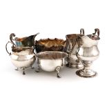 A mixed lot of silver items, various dates and makers, comprising: a George III cream jug of