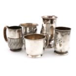 A small collection of five silver mugs, comprising: a George III one by Tudor & Leader, Sheffield