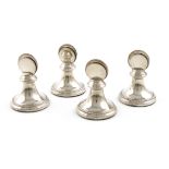 A set of four modern silver menu card holders, by Broadway and Co, Birmingham 1997, plain disc form,