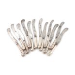 A matched set of twelve 18th century silver-handled pistol-grip dessert knives, unmarked, some