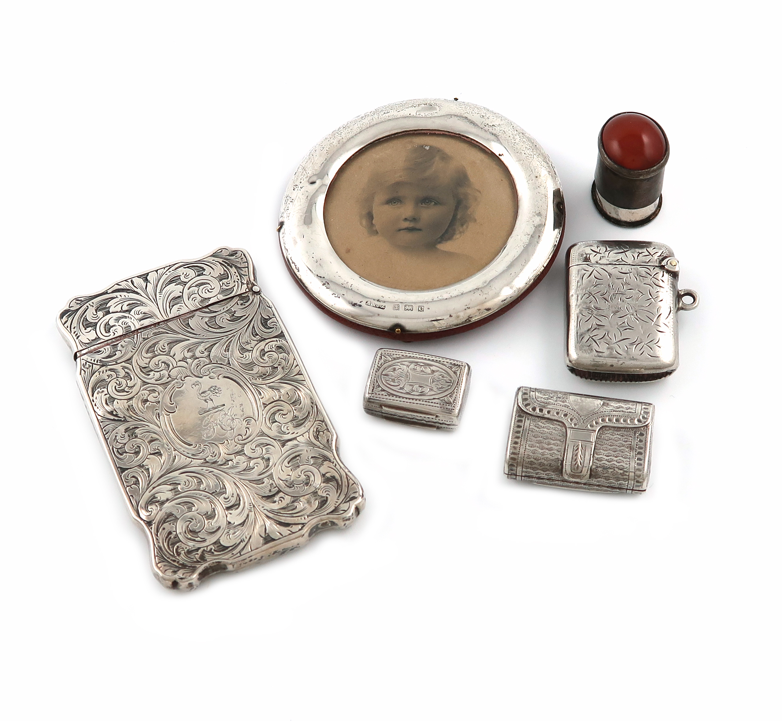 A mixed lot of silver items, comprising: a George III vinaigrette of purse form, Birmingham 1817,