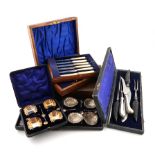 A mixed lot of cased sets, comprising silver items: a set of six fruit knives and forks, by