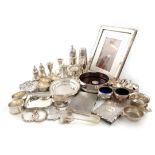 A mixed lot of silver items, various dates and makers, comprising: a six-piece condiment set, by