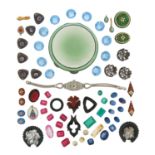 A collection of synthetic and mixed gemstones, including unset diamonds which weigh approximately