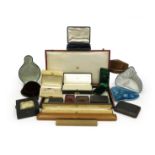 A collection of eighteen jewellery boxes, including a large red Cartier case, 47 x 26 x 1.5cm, a