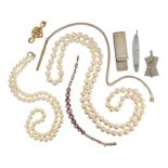 A mixed group of jewellery, including two cultured pearl necklaces, a silver money clip by Tiffany &