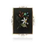 A Victorian pietra dura brooch, the rectangular plaque depicting flowers in hardstone within