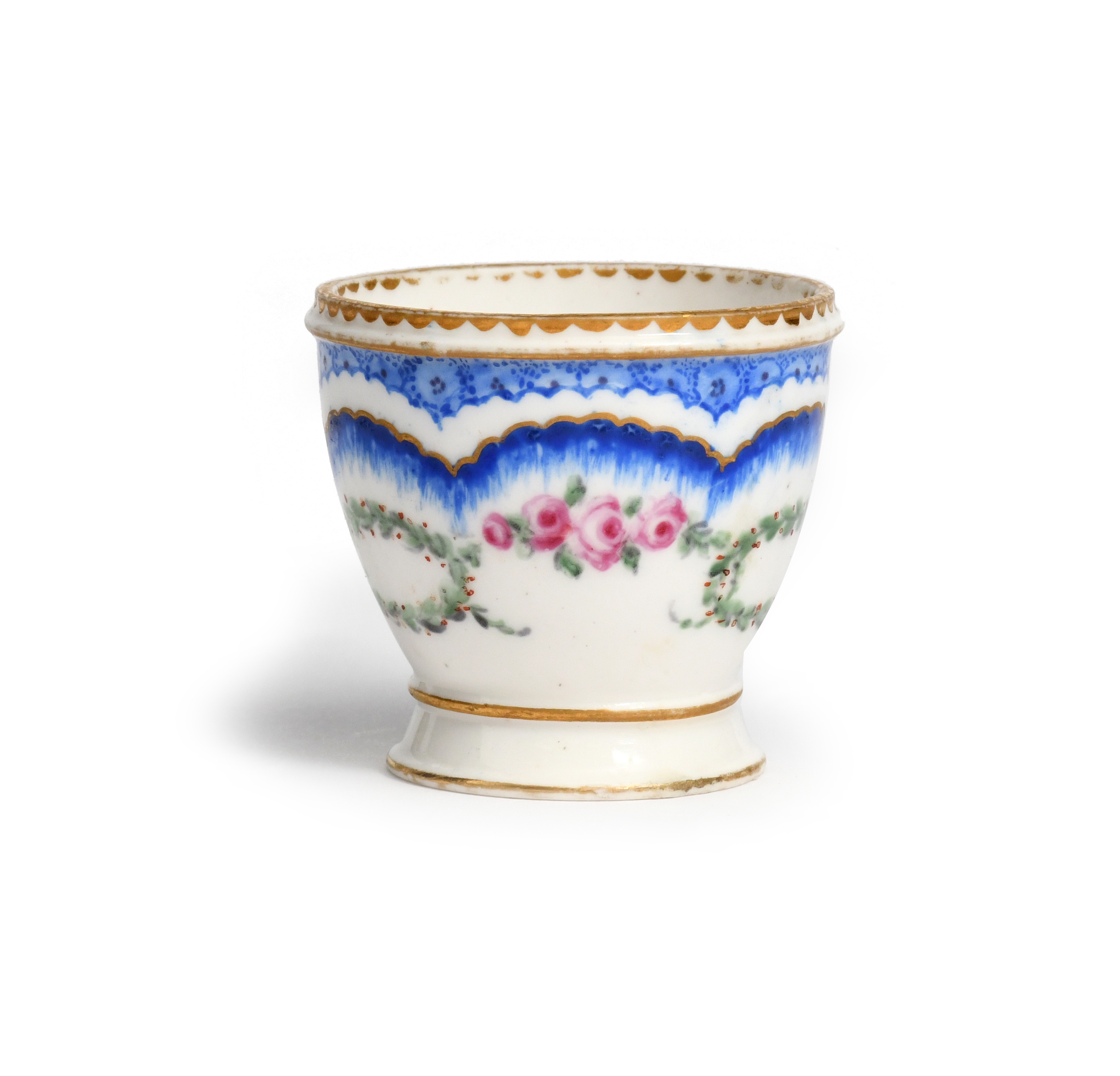 A Sèvres egg cup (coquetier) c.1770-80, the small rounded shape painted by Jean-Charles Sioux l'aine