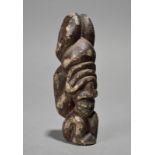 A Kissi nomoli figure Sierra Leone soapstone, squatting with it's hands covering the eyes, 15cm