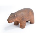 An Inuit model of a polar bear Greenland cedar, 21,5cm long. Provenance Polar Explorer Lieutenant