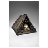 A Solomon Islands skull hut Melanesia reeds and leaf fibre with earth and applied shells with a