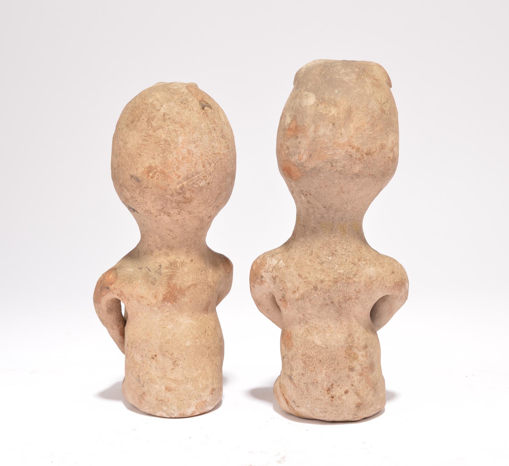 A pair of Pueblo seated rain god figures Southwestern North America earthenware, one holding a - Image 2 of 3