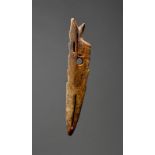 λAn Inuit harpoon head Old Bering Sea, Alaska, circa 200 - 500 AD marine ivory, with barbed edges,