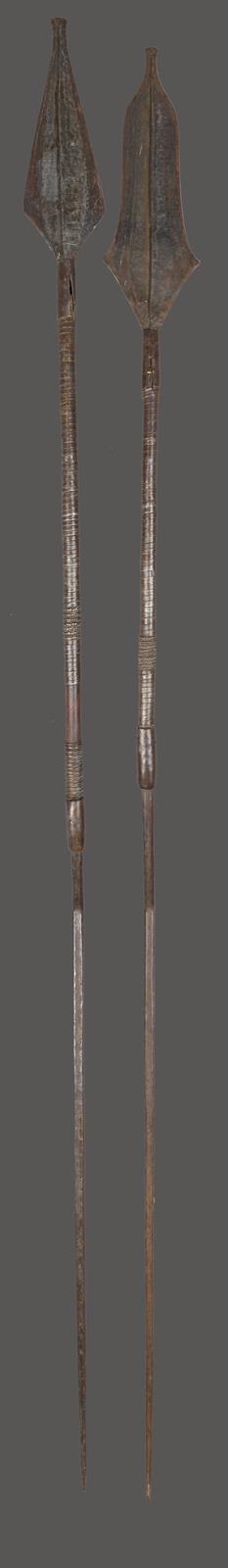 Two Mbole spears Democratic Republic of the Congo the iron tips with linear decoration on coil metal