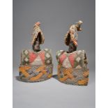 A pair of Yoruba Ibeji figures Nigeria male and female, with differing coiffures, wearing beadwork